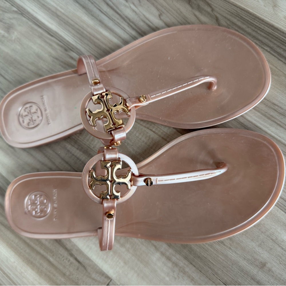 Rose Gold Tory Burch pool flip flops in water proof material